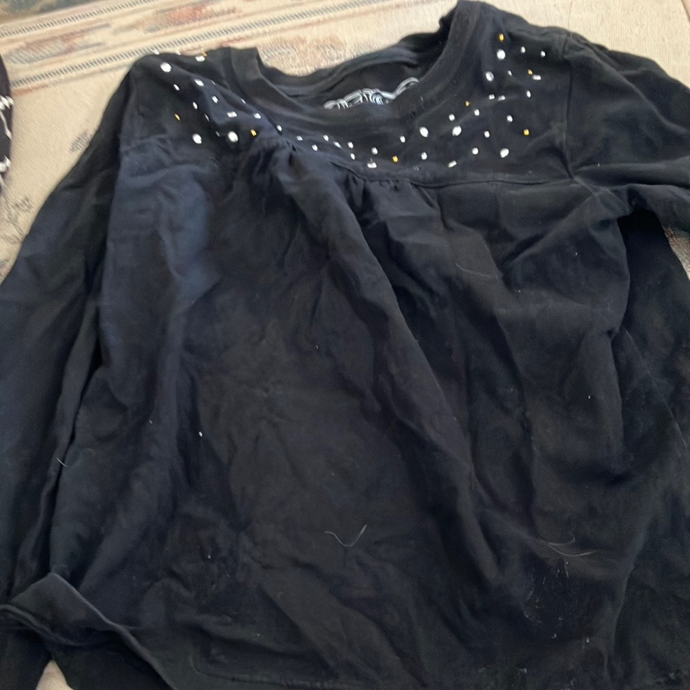 Place long sleeved tee small